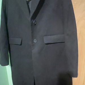 Ladies black long coat never worn.